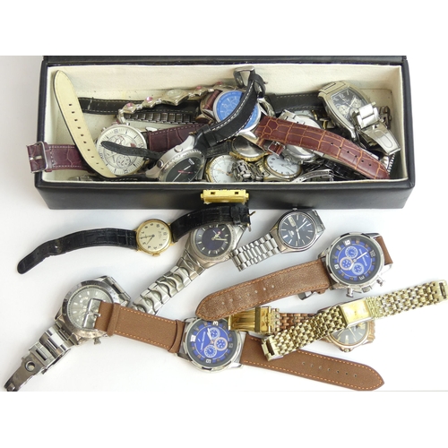 144 - A box of mixed gents watches including a Bentima manual wind example.  UK Postage £15.