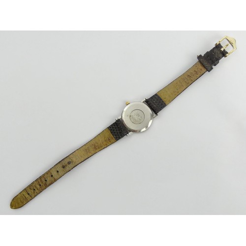 134 - Ladies Omega De Ville date adjust watch with the original box and warranty card. UK Postage £12.
Con... 