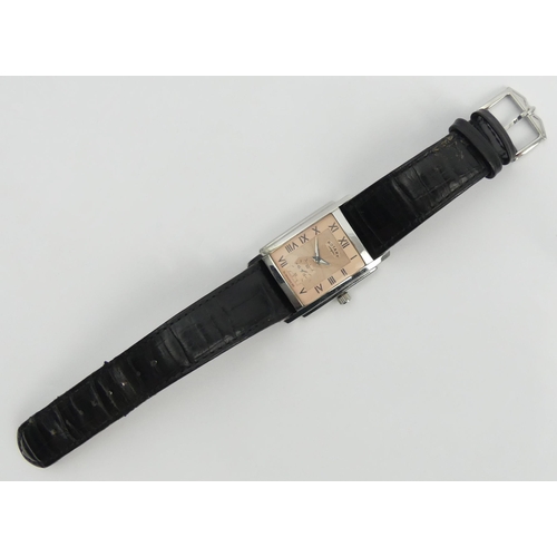 161 - Gents Rotary Quartz tank watch on a black leather strap, 32mm x 45mm inc. crown. UK Postage £12. 
Co... 