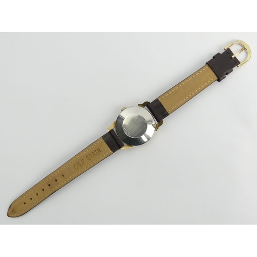 164 - Bulova self-winding gold plated gents watch on a leather strap, 32mm wide. UK Postage £12.
Condition... 