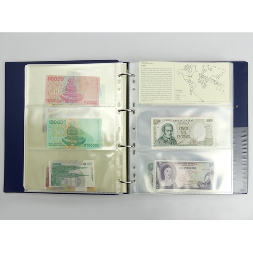 200G - Three folders of un-circulated bank notes from around the world. UK Postage £16.