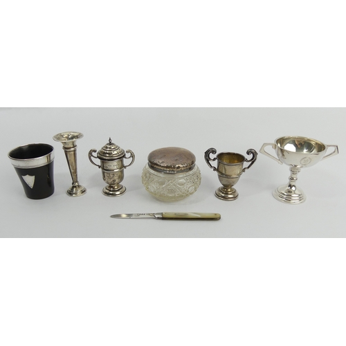 238 - A group of silver items including a pepperette, Chester 1932, 161 grams weighable. UK Postage £12.