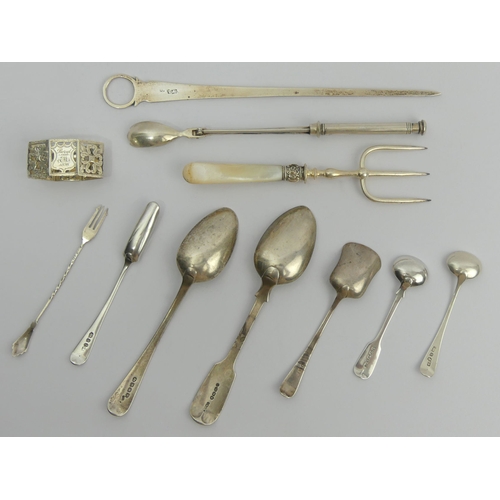 239 - Georgian silver meat skewer, various spoons, a napkin ring, bread fork and a pickle grab and fork. U... 