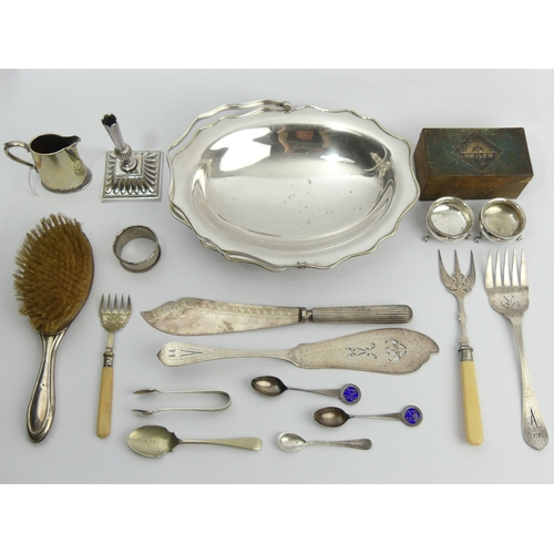 244 - A collection of mostly silver plate items including fish servers and a bread knife. UK Postage £16.