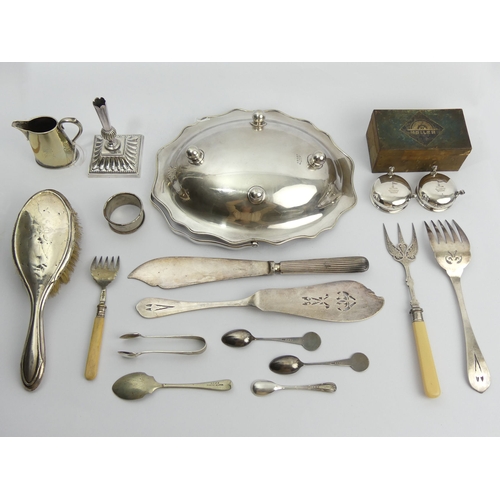 244 - A collection of mostly silver plate items including fish servers and a bread knife. UK Postage £16.