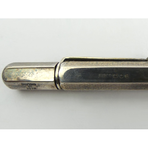 250 - Elizabeth II silver propelling pencil, London 1956, 26 grams, 12cm. UK Postage £12.