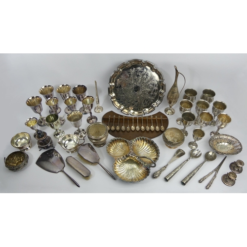 250A - A box of silver and plated items, including goblets, spoons and a brush set (254 grams weighable). U... 