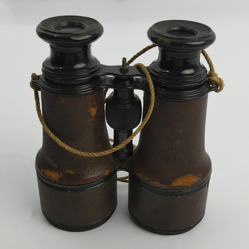 255A - A leather cased set of binoculars issued to W. Swart 1917, made by Le Maire Paris. UK Postage £14.