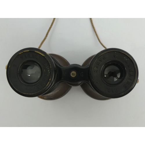 255A - A leather cased set of binoculars issued to W. Swart 1917, made by Le Maire Paris. UK Postage £14.