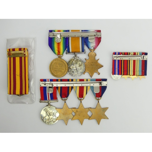 268 - A World War I replica medal trio, a miniature set, a World War II set and a Dunkirk medal. UK Postag... 