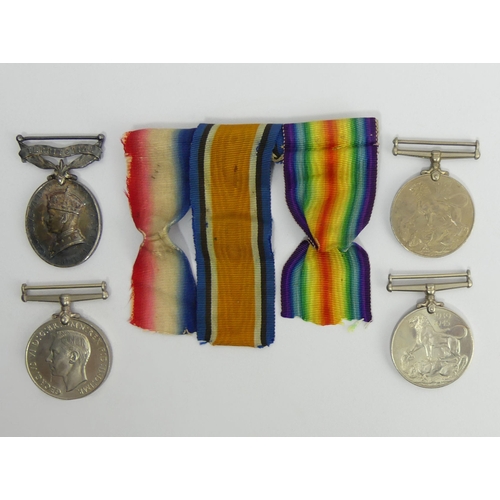 269 - Four World War II medals including 6138766, Col SJT L.P. Hilton E Surr. R. efficient service. UK Pos... 