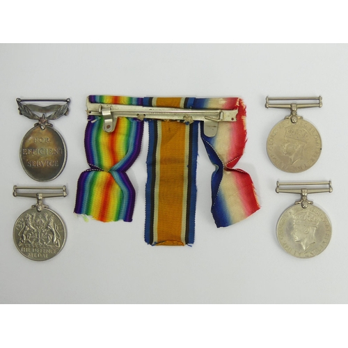 269 - Four World War II medals including 6138766, Col SJT L.P. Hilton E Surr. R. efficient service. UK Pos... 