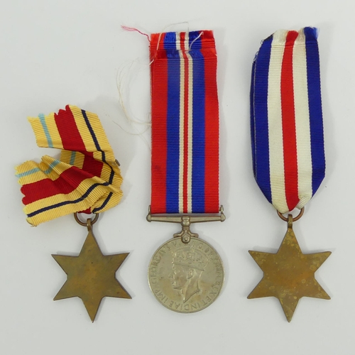 275 - World War II medal trio - France and Germany Star, Africa Star and 1939 - 45 war medal. UK Postage £... 