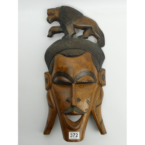 372 - A large carved African wooden mask, 54cm. Collection Only.