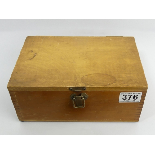 376 - A box of miscellaneous items including pocket knives and a stanhope. UK Postage £14.