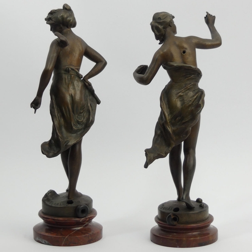 381 - A pair of French figural bronzed lamps, signed Ferrand, 28.5cm. UK Postage £16.