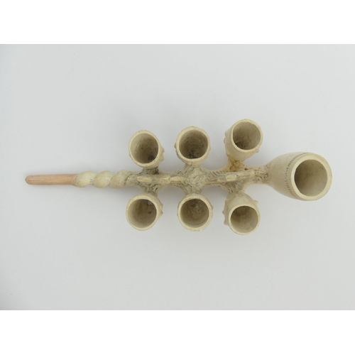 411 - Rare C.19th century unsmoked 7 bowled clay pipe, Polocks Manchester,
13cm. UK Postage £12