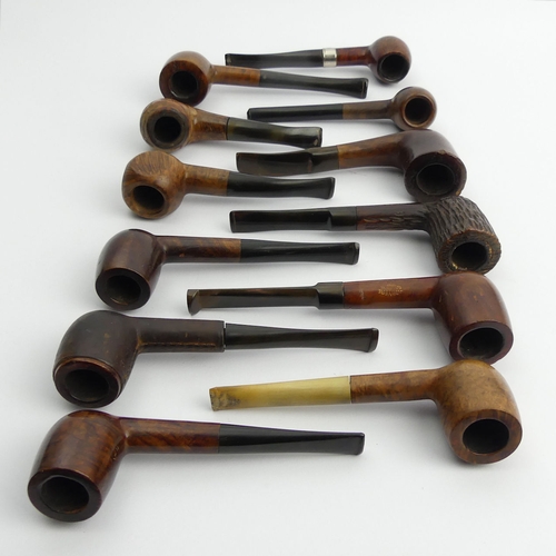 430 - Twelve vintage pre-smoked medium size briar pipes all in reasonable condition. UK Postage £12.