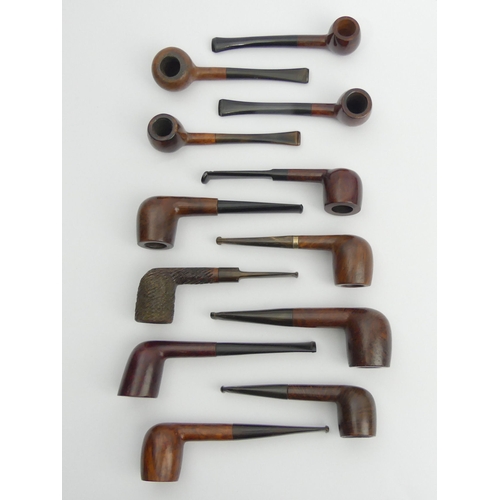 431 - Twelve vintage pre-smoked medium size briar pipes, all in reasonable condition.
UK Postage £12.