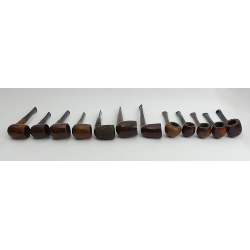 431 - Twelve vintage pre-smoked medium size briar pipes, all in reasonable condition.
UK Postage £12.