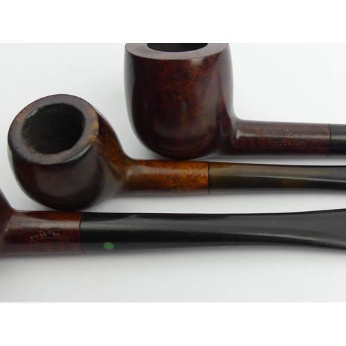 431 - Twelve vintage pre-smoked medium size briar pipes, all in reasonable condition.
UK Postage £12.