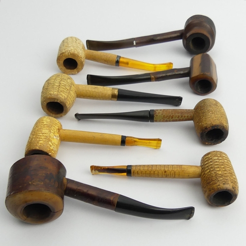 432 - Seven vintage pipes pre-smoked in reasonable condition - 3 Ropp cherrywood pipes, 5 corn cob pipes. ... 