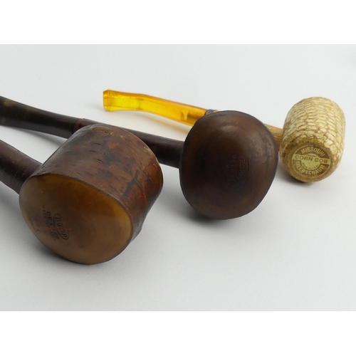 432 - Seven vintage pipes pre-smoked in reasonable condition - 3 Ropp cherrywood pipes, 5 corn cob pipes. ... 