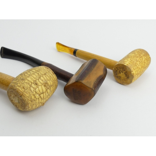 432 - Seven vintage pipes pre-smoked in reasonable condition - 3 Ropp cherrywood pipes, 5 corn cob pipes. ... 