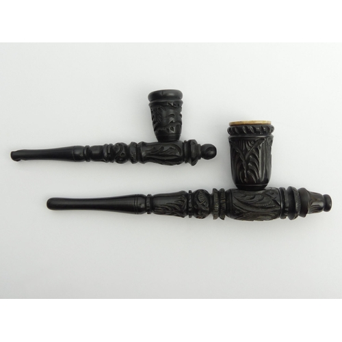 450 - Two carved wood Greek pipes, one with a meerschaum liner. UK Postage £12.