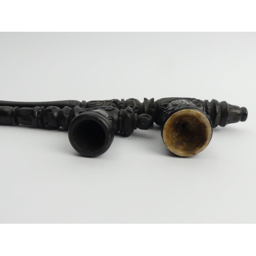 450 - Two carved wood Greek pipes, one with a meerschaum liner. UK Postage £12.