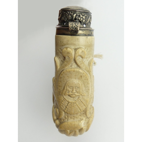 451 - A large meerschaum elbow pipe carved with a dog finial at the rear and a shield with a medieval face... 