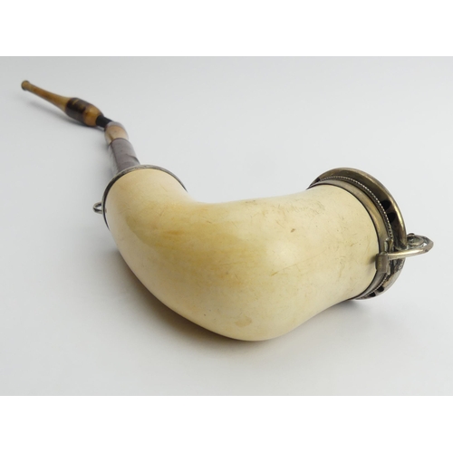 454 - A C.1850 German or Austrian meerschaum elbow pipe with silver mounts and lid, cherrywood stem and st... 