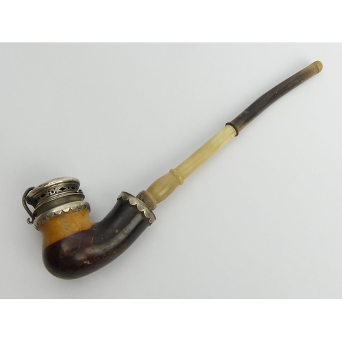 459 - A C.1850 German or Austrian elbow pipe with silver mounts and lid, cherry wood stem and staghorn mou... 