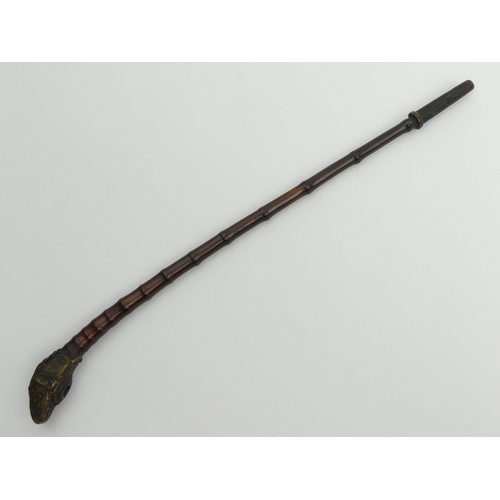 633 - 19th century bamboo opium pipe from Southeast Asia with brass mounts, 42cm. UK Postage £12.