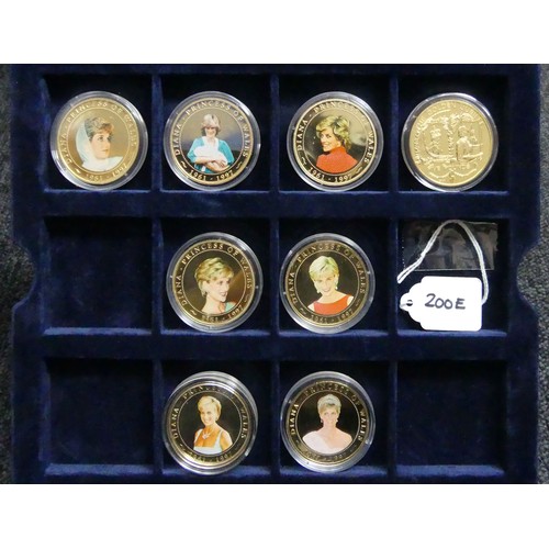 200E - A presentation box of 25 royal commemorative and other coins including some silver examples. UK Post... 