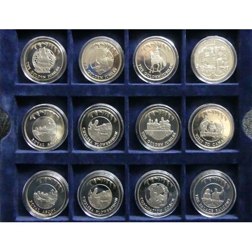 200F - A presentation case of royal commemorative silver and other coins. UK Postage £14.