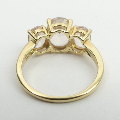 11 - 9ct gold three stone pink quartz ring, 3.1 grams, 9.1mm, size N.