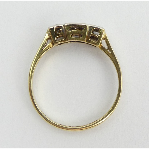 35 - 18ct gold and platinum diamond three stone ring, 2.4 grams, 4.9mm, size O.