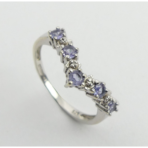 37 - 9ct white gold tanzanite and diamond ring, 1.8 grams, 3.3mm, size M1/2.