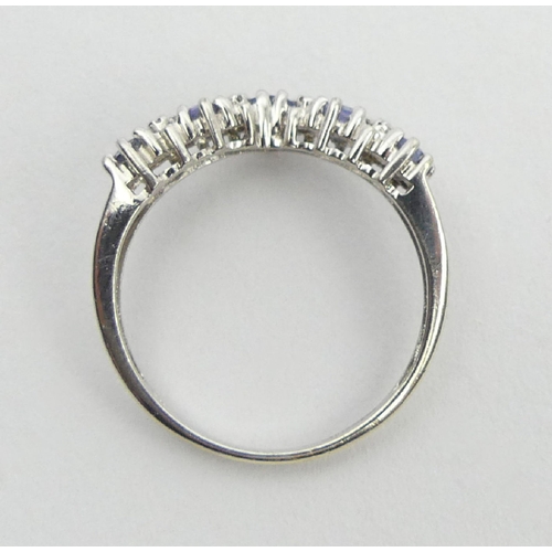 37 - 9ct white gold tanzanite and diamond ring, 1.8 grams, 3.3mm, size M1/2.