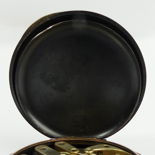 129 - An oversize gun metal pocket watch from the early 20th Century, 95mm x 65mm.