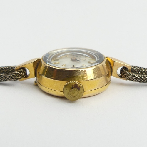 156 - Ladies Omega 14ct gold manual wind watch, 18mm including button. UK Postage £12. Condition Report: W... 