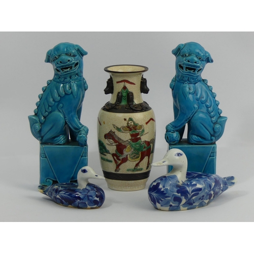 346 - A pair of Chinese turquoise glazed temple lions, a Chinese crackle ware warrior vase and two blue & ... 