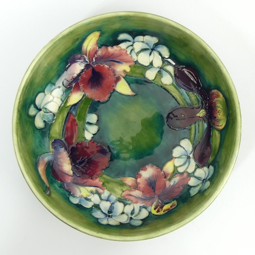 395 - Moorcroft art pottery orchid design fruit bowl, 27cm x 8cm. UK Postage £16.