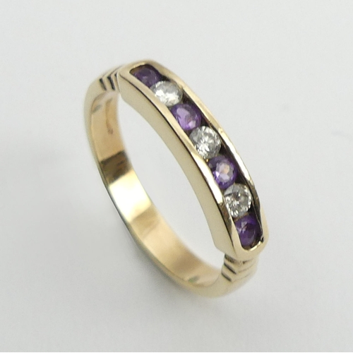 18 - 9ct gold channel set amethyst and diamond ring, 2.7 grams, 3.8mm, size M1/2.