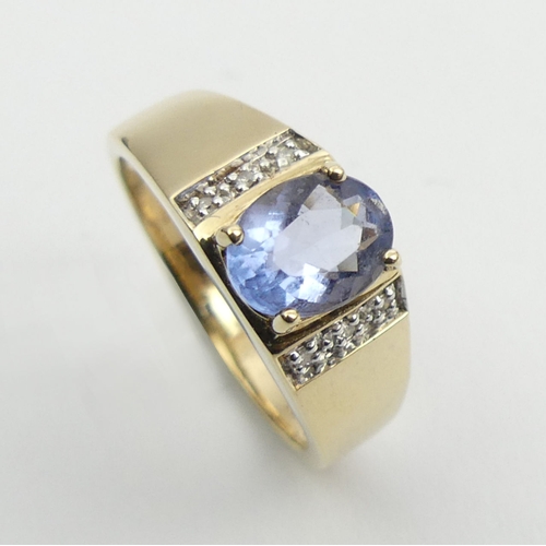 22 - 9ct blue topaz and diamond ring, 3.6 grams, 8mm, size P.