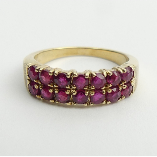 6 - 9ct gold 14 stone ruby ring, 4.1 grams, 6mm, size N.