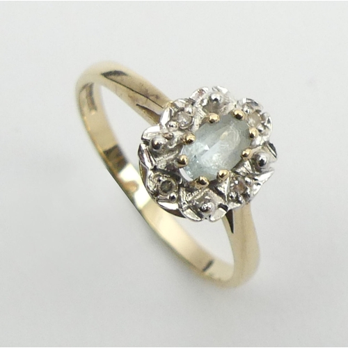 9 - 9ct gold aquamarine and diamond ring, 1.6 grams, 9mm, size L.