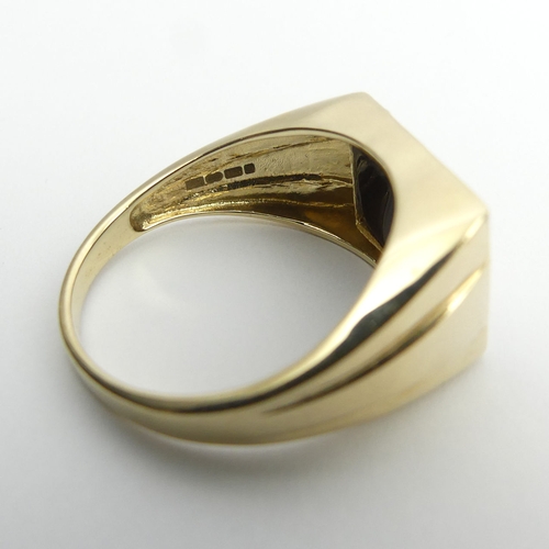 32 - Gents 9ct gold diamond set eagle design ring, 5.9 grams, 12mm, size X.