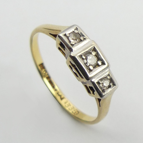 35 - 18ct gold and platinum diamond three stone ring, 2.4 grams, 4.9mm, size O.